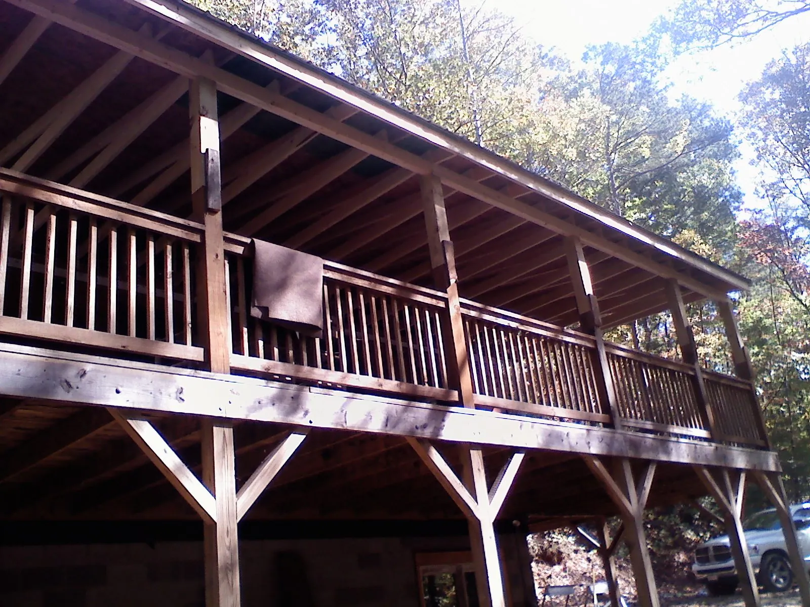 Timber framing under a new elevated porch and deck — Roof Leak Repair in Secaucus by Roofing Brothers